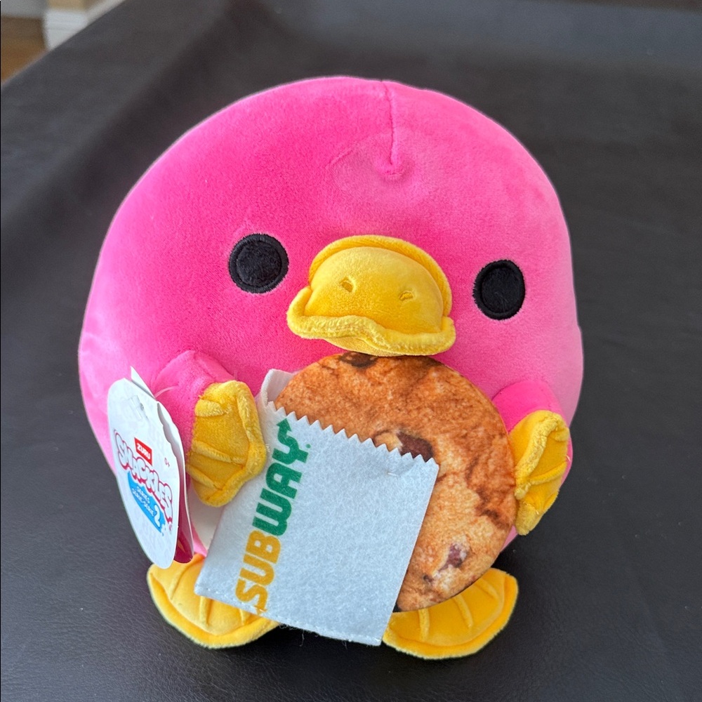 Adorable, plush duck with Subway cookie